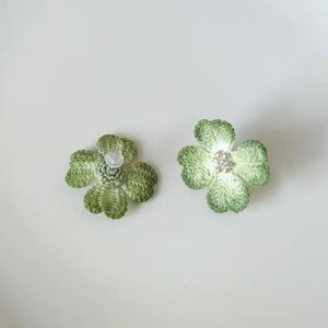 green stud earrings