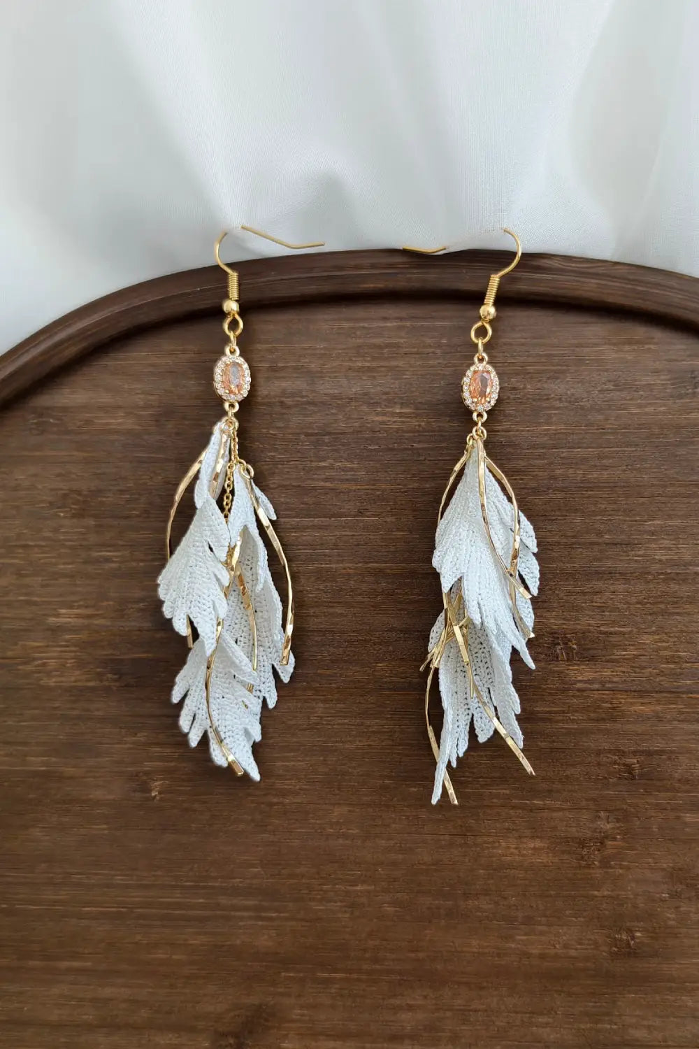 white feather earrings